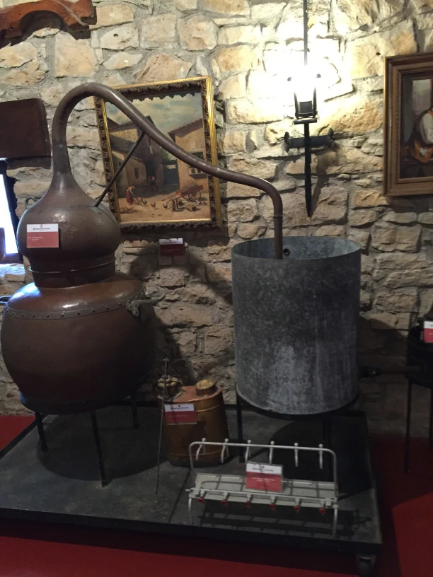 This is an image of
               an antique wine making device.